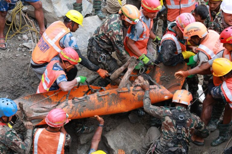 Nepal flood survivor Kabir Maharjan carried by rescue team after 9 days trapped in Rasuwa hydropower tunnel