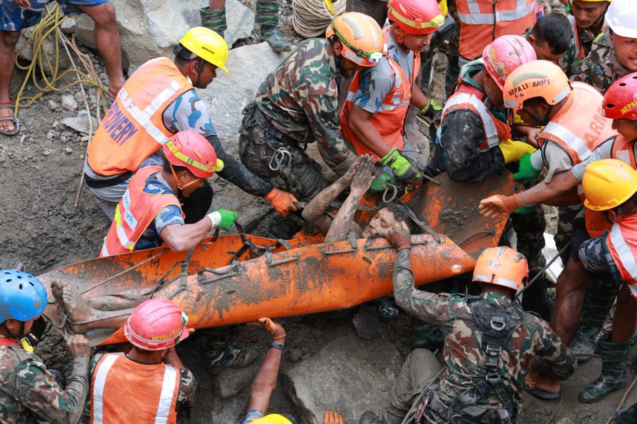 Nepal flood survivor Kabir Maharjan carried by rescue team after 9 days trapped in Rasuwa hydropower tunnel